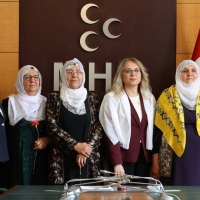 baris-anneleri-heyeti-mhp-yi-ziyaret-etti-1.jpg