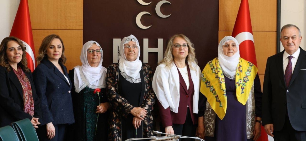 baris-anneleri-heyeti-mhp-yi-ziyaret-etti-1.jpg